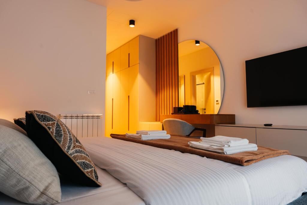 Warmly lit double room at Hotel Nordik